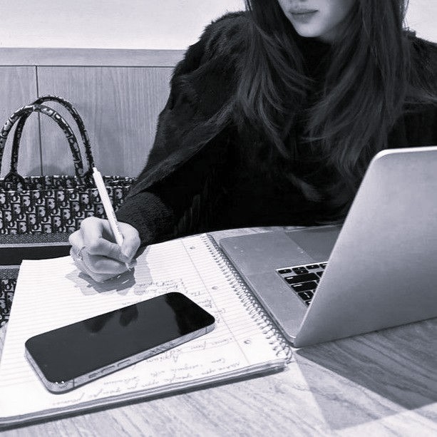 girl studying on laptop